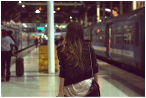 Indira in a train station